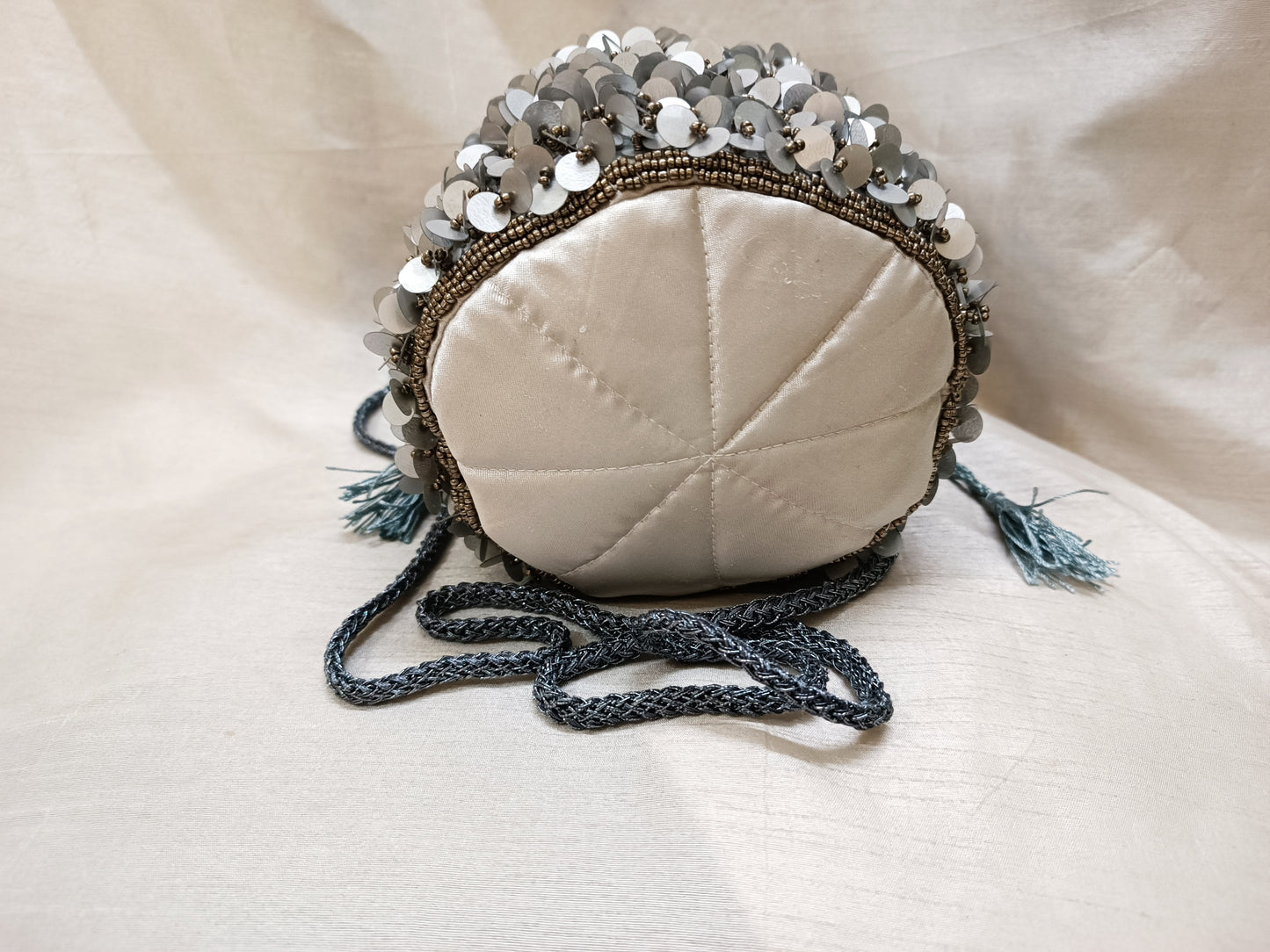 Silver Pearl Embellished Beaded Tassel Potli Bag For Weddings (Silver)