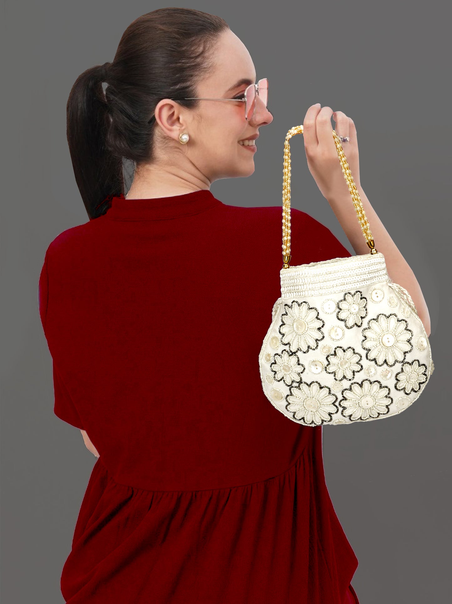 women designer white potli bag