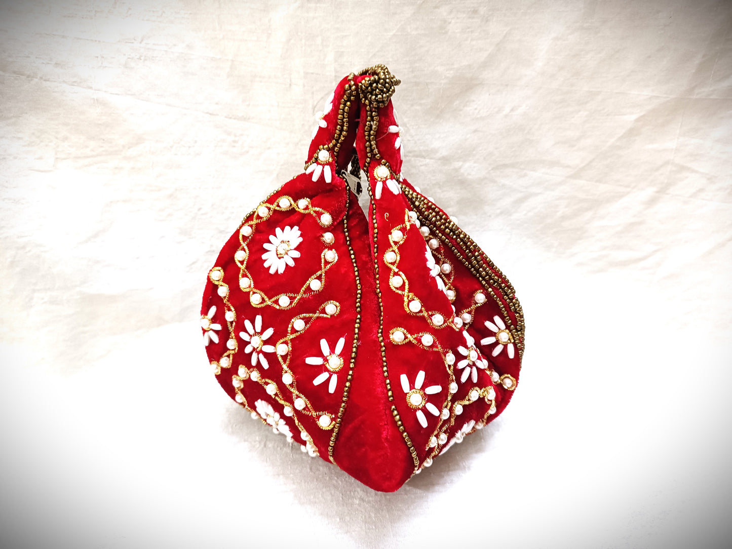 Round shape women potli bag