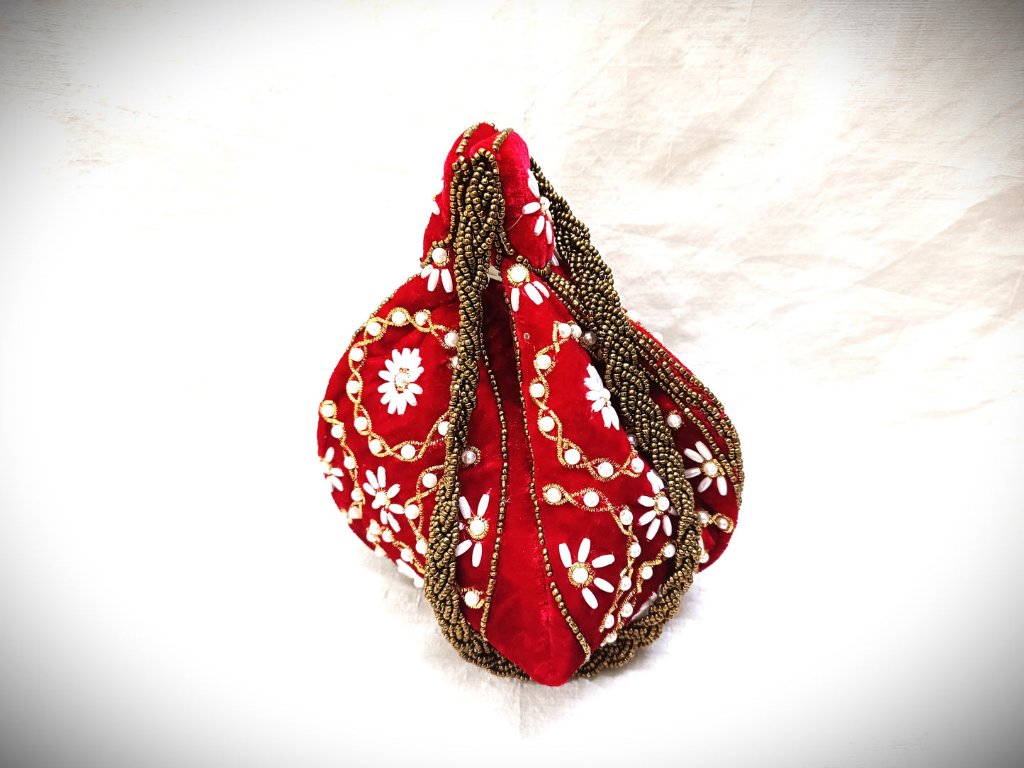 Round shape women potli bag